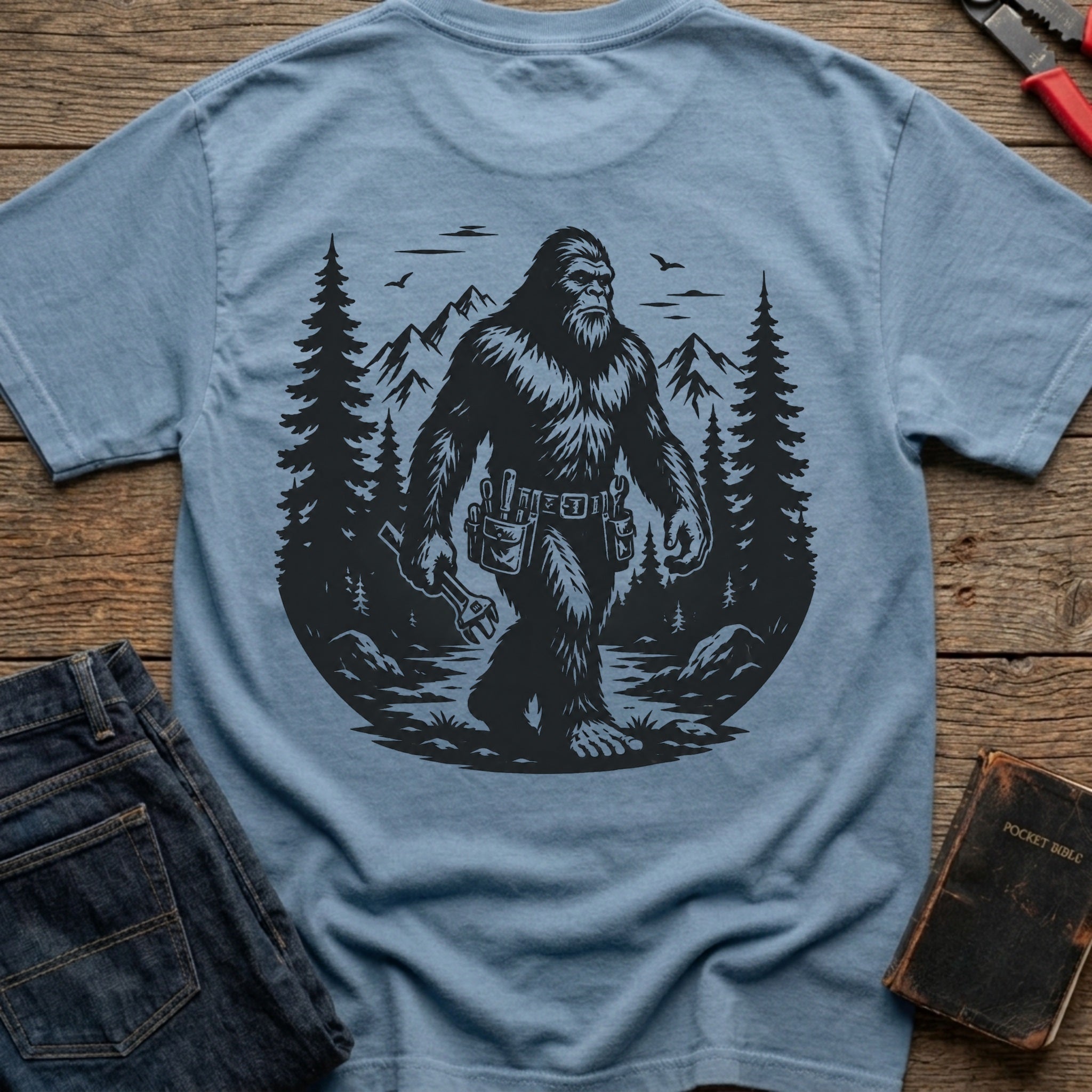 CrossGritOS|asset=6|template=6|color=Blue Jean|view=back|file=Bigfoot-Electrician-T-Shirt-6a4d3ed23fcdce69cd0adc74-printify-art-2-2_Blue-Jean_back_template-6.jpg