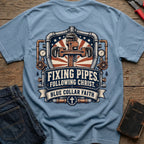 CrossGritOS|asset=27|template=6|color=Blue Jean|view=back|file=Fixing-Pipes-Following-Christ-T-Shirt-6a56b7958a617bb77b0cf10b-printify-art-1-2_Blue-Jean_back_template-6.jpg