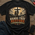 CrossGritOS|asset=48|template=4|color=Black|view=back|file=Hands-That-Restore-T-Shirt-6a553b4abee59db69d0fc9d6-printify-art-1-2_Black_back_template-4.jpg
