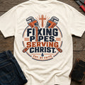 Fixing Pipes Serving Christ T-Shirt