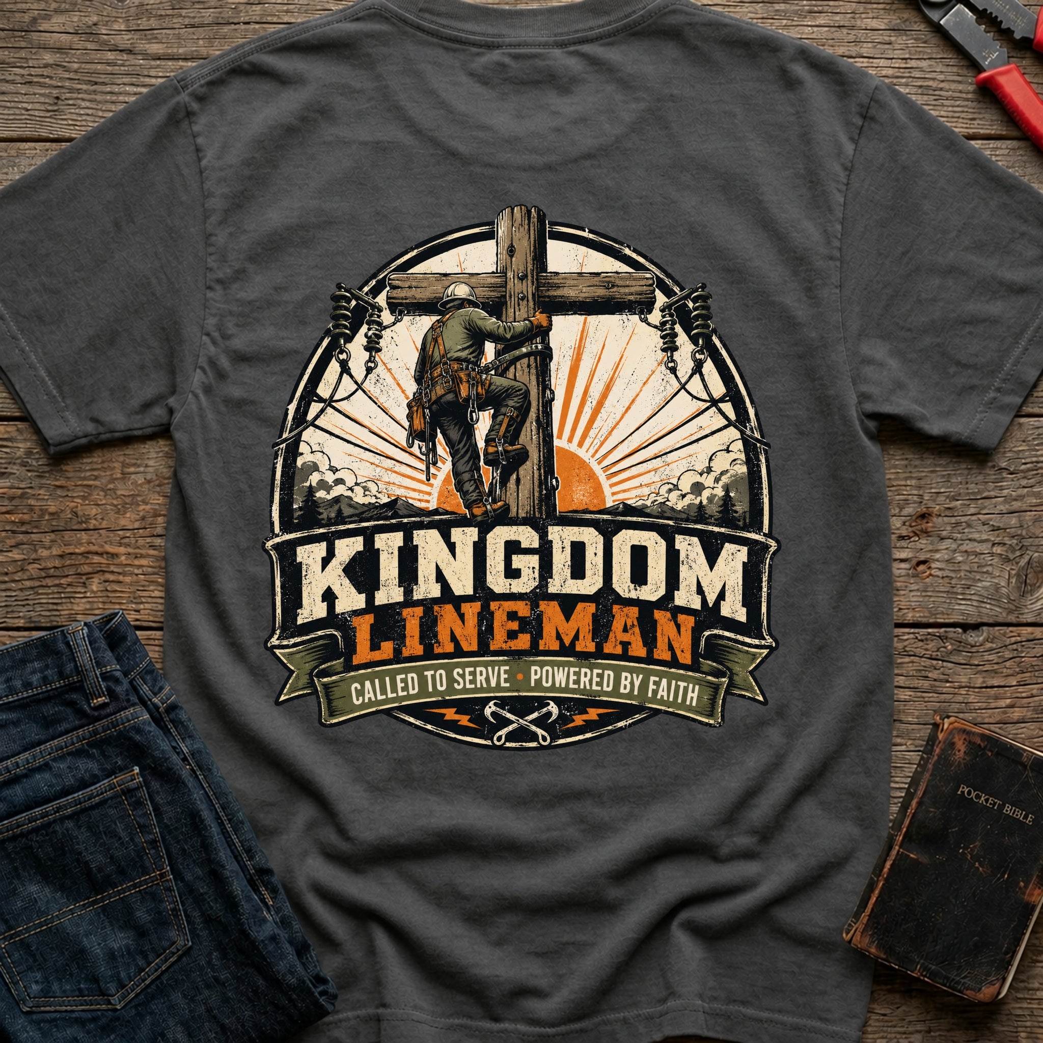 CrossGritOS|asset=45|template=1|color=Pepper|view=back|file=Kingdom-Lineman-T-Shirt-6a553cb6ca43ca1a190e4794-printify-art-1-2_Pepper_back_template-1.jpg